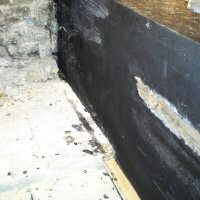 An image showing damp proofing work on the Lalit Hotel in London
