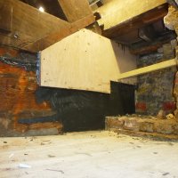 An image showing an attic that has undergone water and damp proofing to prevent mould and damp
